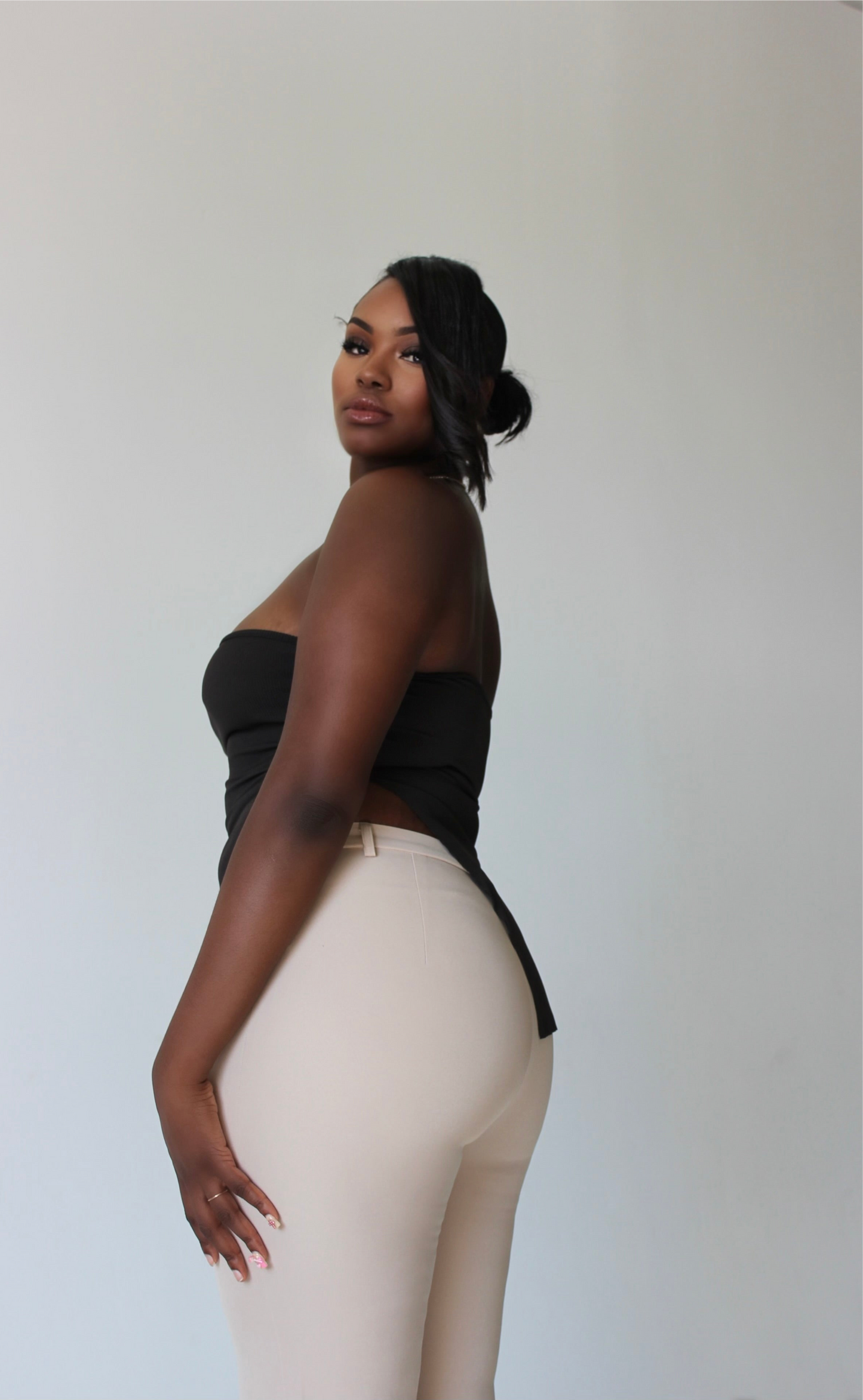 tall model in strapless brown crop top – backless tube top design