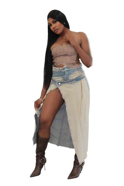 tall woman wearing vintage wash denim maxi skirt with irregular thigh-high slit – front view