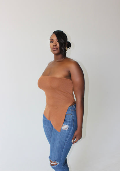 close-up of stretch fabric and asymmetrical hemline on tall women’s tube top