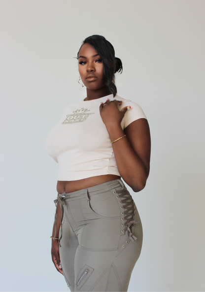 side profile of tall model in utility-style cargo pants with zipper details